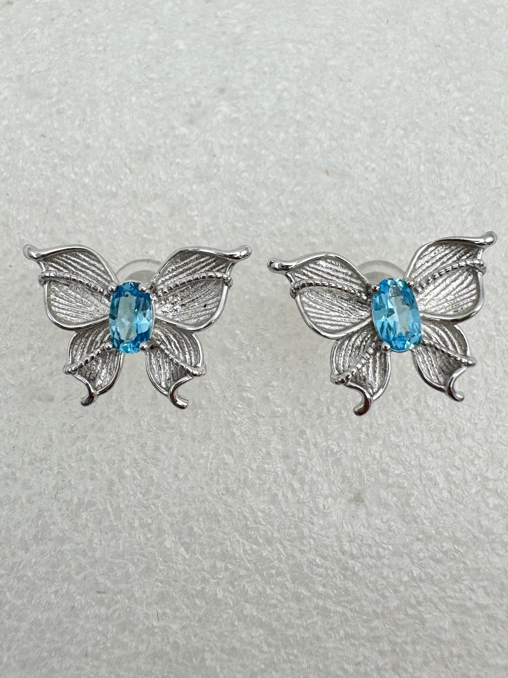 Sterling silver with Swiss blue topaz butterfly earrings